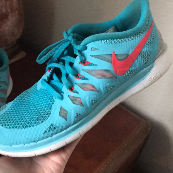 pink and turquoise nike shoes